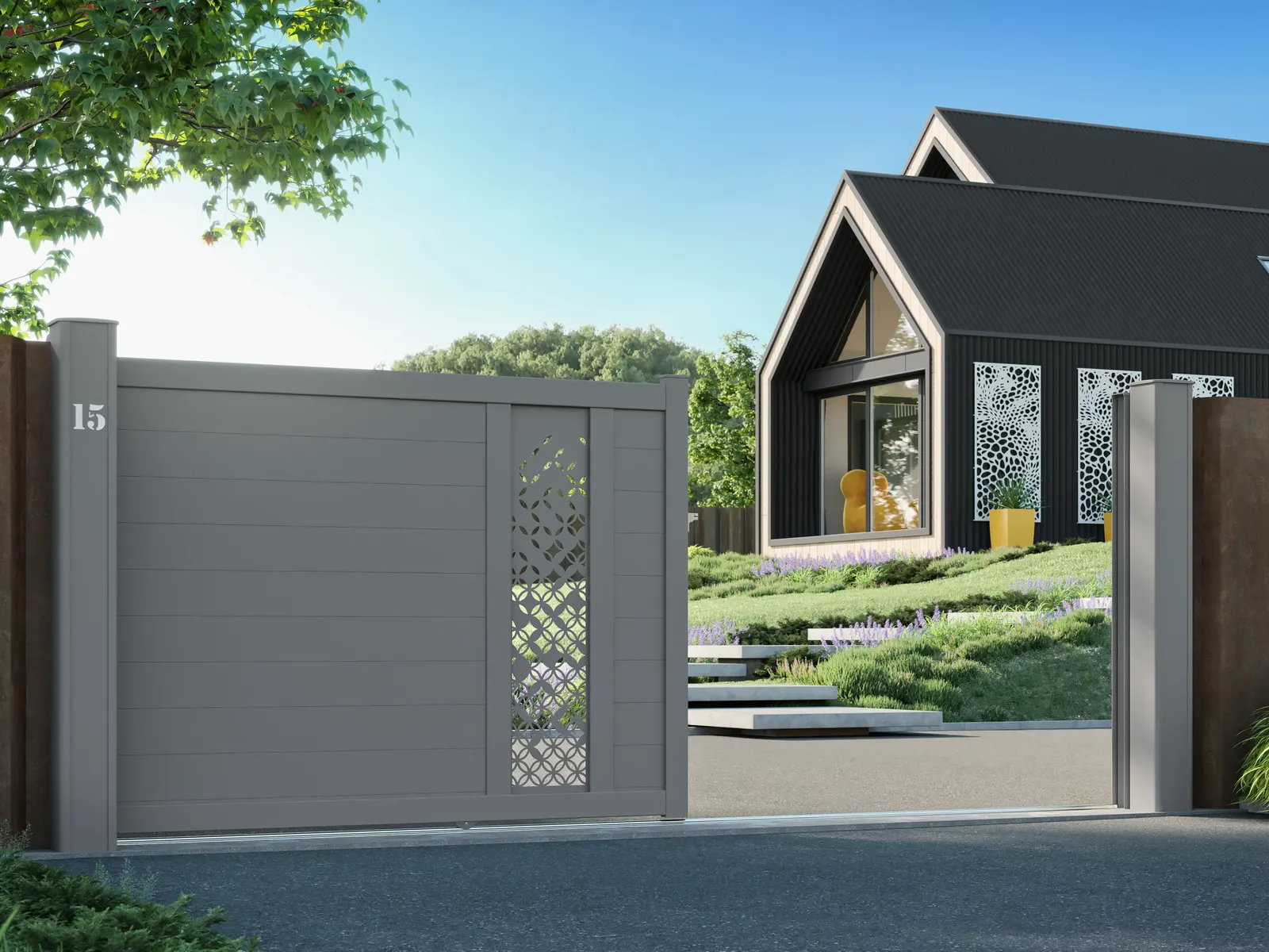 Portail coulissant aluminium blanc à décor découpé, en position ouverte